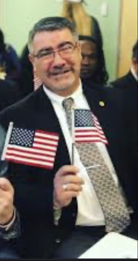 The authors father celebrating the day he received approval for dual citizenship in the U.S. and Great Britain.