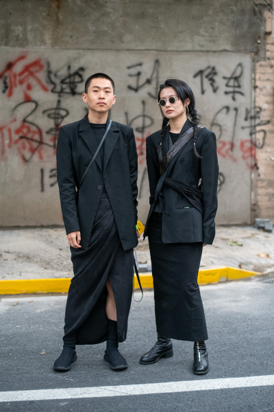 A shot of a couple’s street fashion from Shanghai’s Spring/Summer Fashion Week 2021
