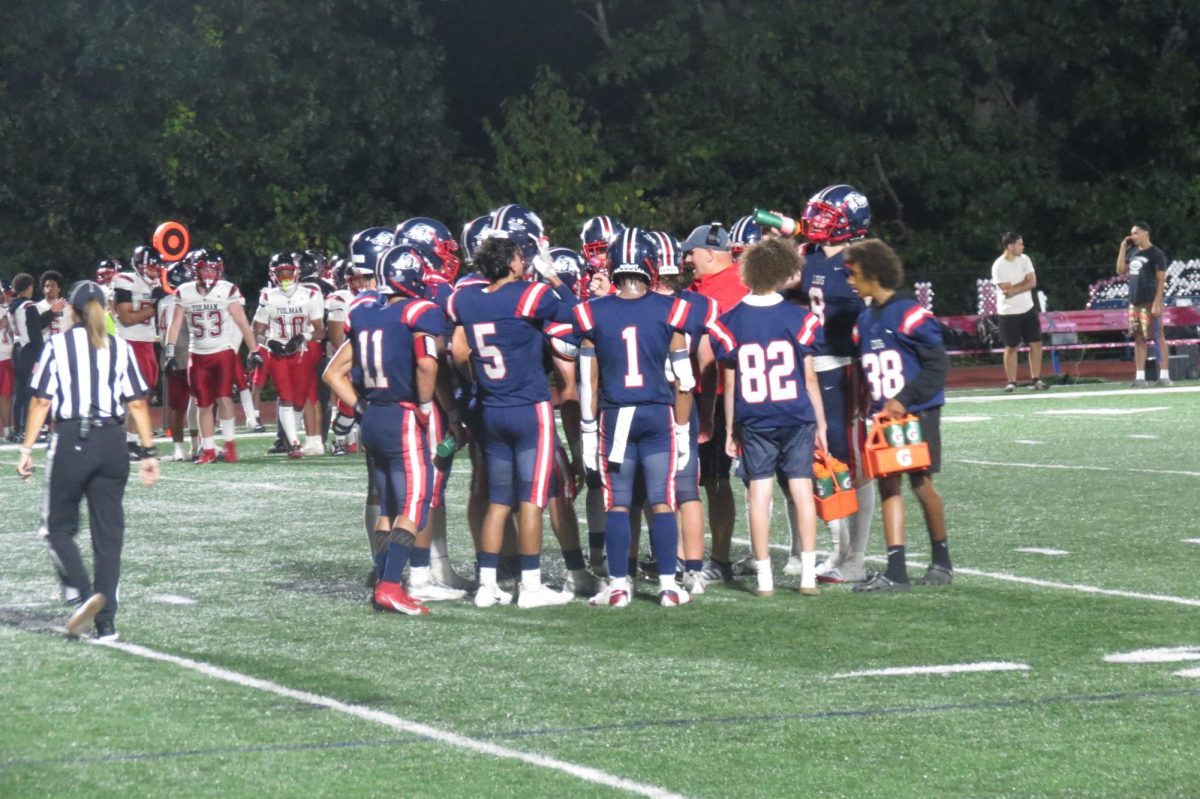 Lions huddle up with the Coach Waters