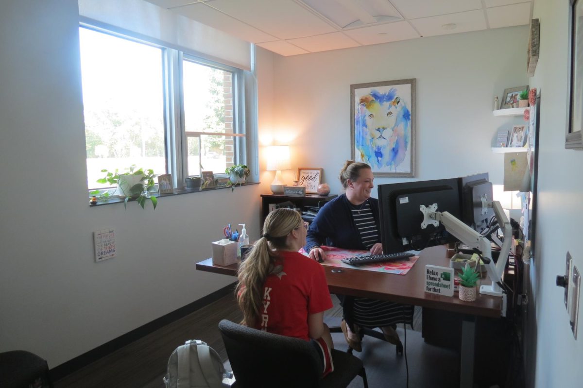 Head of Guidance Mrs. Testoni helping a student in her office