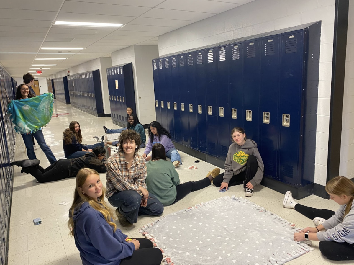 Club for Change Creates Cozy Blankets for Local Shelter Dogs