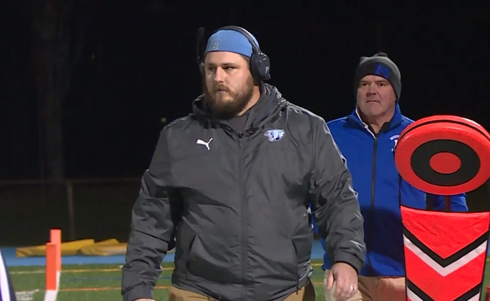 Mr. Robitaille coaching his Johnston football team 
