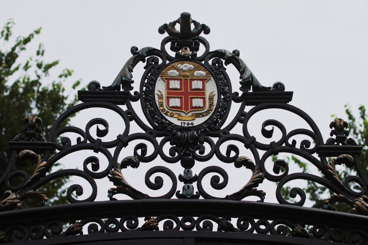 The seal of Brown University sits atop the Van Wickle Gates at the edge of the main campus in Providence, Rhode Island, U.S., August 16, 2022. REUTERS/Brian Snyder