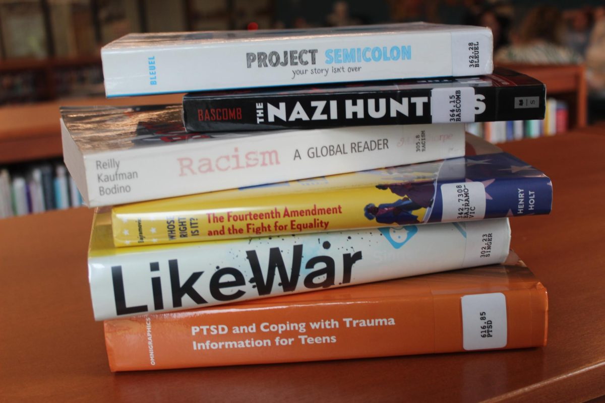 A stack of books about serious and sensitive topics, from the Lincoln High School Library