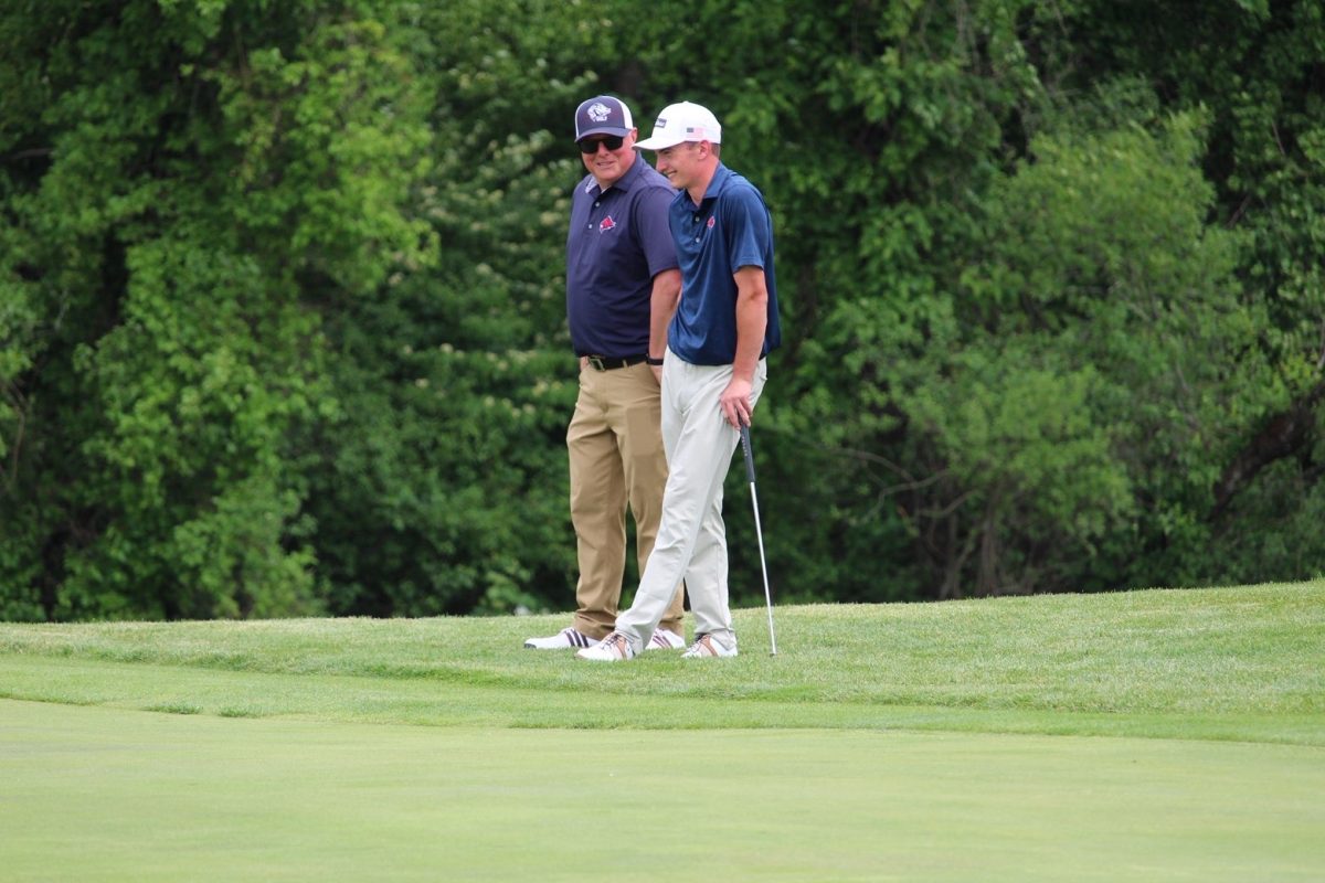 Cavanuagh talks strategy with coach Marasca